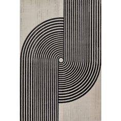 a black and white rug with an abstract design