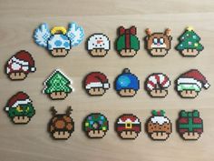 a bunch of pixelated objects sitting on top of a wooden table next to each other