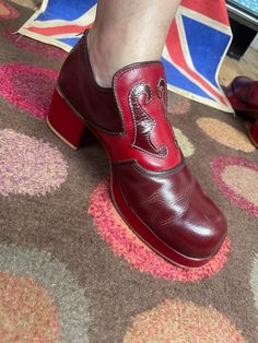 Absolutely outstanding and amazing original platform shoes here. Comes in at a UK 9,USA 10,euro 43 These are Glam rock at it's best. Heel measures 5.8cm and the sole is 2.2cm. A really amazing colour of which is hard to find now,maroon/wine colour and red,condition is very good even though the backs of both shoes around the heel area shows wear,probably where the shoes have been forced on,shoes in this colour generally can look really bad because the knocks stand out,these look amazing and the heels are near enough un touched,the generally get the heel knocks,the elastic that is under each tongue has come away but as shown this makes no difference to how the shoe is worn as in pic 1. Unknown maker but styled by Eugenio,Spanish possibly. Some beautiful platforms out there and these are up t Retro Round Toe Platform Heels, Retro Platform Heels With Round Toe, Retro Heels With Red Sole And Round Toe, Red Retro Block Heel Shoes, Retro Red Block Heel Shoes, Vintage Red Round Toe Heels, Vintage Red Heels With Round Toe, Retro Chunky Platform Heels, Vintage Chunky Platform Heels With Closed Toe