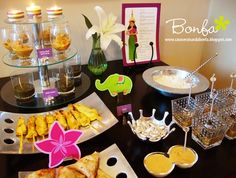 a table topped with lots of food and condiments