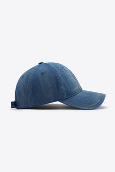 a blue baseball cap on a white background