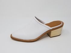 Made in Los Angeles Full Leather Upper Full Leather Lining Leather outsole Wood heel 5mm Memory foam leather insole Leather Slip-on Mules With Reinforced Heel, White Medium Width Leather Mules, White Slip-on Heels With Rubber Sole, Classic White Mules With Removable Insole, White Open Heel Mules With Reinforced Heel, White Leather Mules With Block Heel, White Leather Mules With Wooden Heel, White Leather Mules With Stacked Heel, White Leather Block Heel Mules