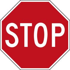 a red stop sign with white letters on it