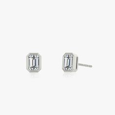 The Bezel Solitaire Studs combine vintage-inspired detail and modern appeal together for a look that’s timelessly elegant. Solitaire Studs, Emerald Earrings, Emerald Cut, Diamond Shapes, Solid Gold, Vintage Inspired, Emerald, White Gold, Gold