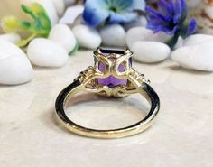 Don't miss this opportunity to own this beautiful gemstone ring crafted in 14k gold filled => Gemstone Type - Amethyst, Clear Quartz => Gemstone Cut - Faceted => Gemstone Size - 8*10 mm, 2 mm => Total Number of Gemstones - 7 => Metal Type - 14k Gold Filled (Tarnish Resistant And Nickel Free) - also available in 925 sterling silver * Please contact me for pricing on a sizes larger than 11 * ~ Feel free to ask me about custom made designs. ❏ Replacements and custom orders : ✪ 925 st Yellow Gold Rings With Rectangular Accent Stones, Rectangular Purple Rings With Accent Stones, Anniversary Rings With Vs Clarity Rectangular Stone, Rectangular Rings With Accent Stones For Anniversary, Fine Jewelry Rectangular Rings With Accent Stones, Rectangular Birthstone Ring With Prong Setting For Anniversary, Rectangular Promise Ring With Accent Stones, Square Cut Rings With Accent Stones For Wedding, Rectangular Promise Ring With Center Stone