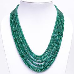 Presenting our exquisite 6 Layered Emerald Gemstone Smooth Rondelle Beads Necklace, a handcrafted masterpiece designed to enhance elegance and allure, perfect for weddings and as a bridesmaid gift. Here's why it's an impeccable choice for celebrating special occasions: Luxurious Emerald Gemstones: Each layer of this necklace is adorned with smooth rondelle beads made from genuine emerald gemstones. Renowned for their rich green hue and natural beauty, emeralds symbolize love, renewal, and growth Luxury Green Beaded Necklace For Celebration, Luxury Beaded Emerald Necklace, Luxury Rondelle Emerald Necklace, Elegant Polished Rondelle Beads Gemstones, Elegant Emerald Beaded Necklaces, Emerald Rondelle Faceted Beads Jewelry, Formal Emerald Necklace With Faceted Round Beads, Formal Emerald Necklace With Round Gemstone Beads, Elegant Green Beaded Gemstones