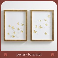 two framed pictures with butterflies on them and the words pottery barn kids written in gold