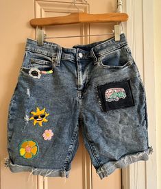 Boho|Hippie upcycled denim. Each pair of jeans/ jean shorts  are unique, they will have simplistic imperfections and fraying to enhance the vintage vibe. Created with original handmade patches by me and purchased patches.  Send me your jeans($20 discount), and we can work together to create a pair to match your style!  This creation: Gap Bermuda Shorts with 9" inseam:  size 4(27). Denim Blue Patchwork Shorts For Spring, Spring Denim Blue Patchwork Shorts, Casual Medium Wash Patchwork Shorts, Spring Patchwork Denim Blue Shorts, Patchwork Cutoff Jean Shorts For Summer, Summer Patchwork Cutoff Jean Shorts, Patchwork Jean Shorts For Summer, Summer Patchwork Jean Shorts, Denim Blue Patchwork Jean Shorts For Spring