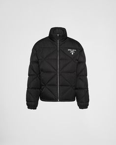 Black Re-nylon Down Jacket | PRADA Designer Nylon Outerwear For Outdoor, Designer Nylon Puffer Jacket For Fall, Winter Nylon Windbreaker With Zip Cuffs, Luxury Nylon Outerwear For Streetwear, Designer Black Nylon Outerwear, Nylon Outerwear With Zip Cuffs For Outdoor Use, Designer Nylon Outerwear For Fall, Classic Nylon Outerwear With Padded Collar, Classic Black Nylon Outerwear