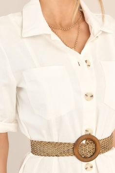 Stay cool and stylish in this breathable Reach Land's End Ivory Button Down Shirt Dress. With its cute and simple design, this classic dress is perfect for any occasion. Perfect for a casual day out or dressed up for a night on the town. Features a collar neckline, functional buttons, roll tab sleeves, a detachable woven & wooden belt, and two breast pockets. 97% Cotton, 3% Spandex Hand Wash Cold Unlined Belt measures 40.5" Imported Model is wearing a size small Button Shirt Dress, Land's End, Button Down Shirt Dress, Red Dress Boutique, Woven Belt, Classic Dress, Boutique Dresses, Large White, Hip Length