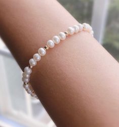 "* DETAILS * - Freshwater Pearl Potato Shape White Pearls Size Approx.5mm - 14k Gold Filled Beads 3mm - All components are 14k Gold Filled  👉🏻 Fits wrist size from 6\" to 7.5\"  * CARE TIPS * - Perfumes: Be sure any perfume or lotions are completely absorbed into skin. - Hair products: Apply all hair products before putting on jewelry. - Swimming: Remove all jewelry before swimming or getting into hot tubes. - No sunlight: Store away from heat, direct sunlight, window sills and vents. - Bedtim White 8mm Beads Jewelry For Anniversary, Elegant Pearl Bracelet With Spacer Beads, Adjustable Pearl White Beaded Bracelet For Anniversary, Yellow Gold Beaded Bracelets With Pearl Charm, Elegant Round Pearl Bracelet With Spacer Beads, Pearl Jubilee Bracelet For Anniversary, Anniversary Pearl Bracelets With Jubilee Bracelet, Hand-strung Rondelle Pearl Bracelet Gift, Classic Beaded Bracelets With Pearl Charm As Gift