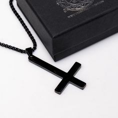 "Experience the allure and power of our gothic-inspired upside down cross necklace, crafted with sturdy black alloy steel. This must-have accessory comes with a sleek 20-inch double-linked black chain, ensuring longevity and offering incredible value. Don't miss out on this one-of-a-kind piece!" Gothic Jewelry With Cross Pendant And Adjustable Chain, Gothic Jewelry With Adjustable Chain And Cross Pendant, Black Cross Jewelry With Adjustable Chain, Minimalist Black Cross Jewelry, Gothic Black Metal Cross Necklace, Gothic Black Crucifix Cross Necklace, Gothic Black Cross Necklace Gift, Minimalist Black Cross Pendant Jewelry, Black Cross Necklace As Gift