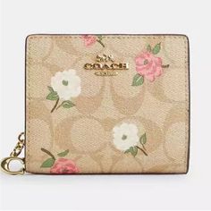 Nwt Coach Snap Wallet In Signature Canvas With Floral Print Please Check The Provided Measurements Below To Help Yourself Decide If It's The Right Size For You. No Box/No Dust Bag Color Gold/Light Khaki Chalk Multi Measurements Length: 4.25" Height: 3.5" Width: 1.0" Materials Signature Coated Canvas And Smooth Leather Features Outside Zip Coin Pocket Snap Closure Full-Length Bill Compartment Three Credit Card Slots Cr969 Pet And Smoke Free Home Cute Coach Wallet, Beige Travel Bag With Coin Pocket, Beige Travel Coin Purse With Coin Pocket, Beige Wallet With Coin Pocket For Daily Use, Beige Bag With Coin Pocket For Daily Use, Compact Beige Wallet With Interior Card Slots, Compact Beige Wallet With Card Slots, Compact Beige Coin Purse For Daily Use, Coach Travel Wallets With Zipper Closure