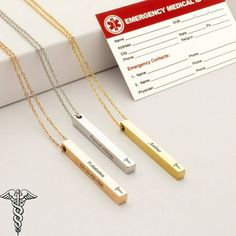 Gift yourself or a loved one to one of Anavia Jewelry's new engravable bar necklace. Our 4-sided bar necklace is a unique and meaningful way to carry around personal and medical information around your neck. The bar necklace is able to engrave 3 sides with up to 15 characters max. The bar necklace comes standard with the medical alert logo on the front. Engraving details will be centered. Engraving Ideas:  First and Last Name  Date of Birth (DOB)  Medical Conditions  Life Threatening Medications Laser Engraved Jewelry, Alert Logo, Religious Names, Jewelry Mood Board, Medical Alert Jewelry, Medical Alert Necklace, Engraving Ideas, Necklace Bar, Engraved Bar Necklace