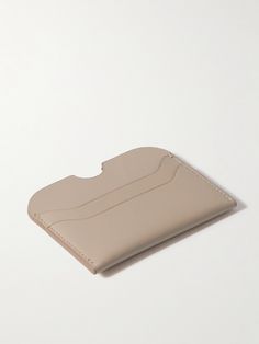 Acne Studios' leather accessories are just as cool and clean-cut as the Scandinavian label's clothing. Notched for easy access to four cards, this holder has been made in Italy from durable leather and has a central compartment for folded bills and receipts. Modern Beige Wallet With Interior Card Slots, Luxury Leather Beige Card Holder, Luxury Beige Leather Card Holder, Beige Leather Rectangular Card Holder, Rectangular Beige Leather Card Holder, Beige Leather Card Holder With Card Slots, Beige Leather Wallet With Rfid Blocking, Beige Leather Wallet With Interior Card Slots, Beige Leather Wallet With Card Slots