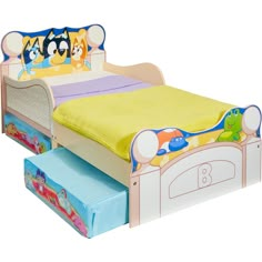 a child's bed with three cartoon characters on the headboard and foot board