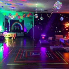 a party room with disco lights and decorations