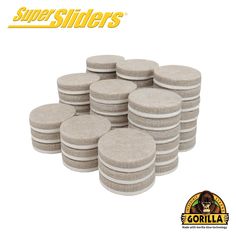 a bunch of small round stone coasters sitting on top of each other