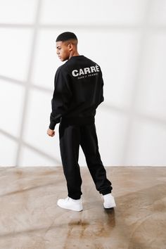 Stay cosy this season with the Motion Crewneck. Featuring a reflective print on the front and back and ribbed cuffs, collar, and hemline to keep that cool air out. Made with Carré Motion Fabric designed by fabric specialists to be a heavier weight material that still feels light and breathable with buttery softness. - Made with Carré Motion Fabric - 400GSM - Reflective Carré logo prints - Ribbed cuffs, collar, and hem - Regular fit - Material 100% Cotton - Colour: Black - Style: CAMOTIONCN Logo Print Sweater For Winter Loungewear, Urban Winter Activewear Relaxed Fit, Urban Relaxed Fit Winter Activewear, Urban Crew Neck Activewear, Urban Crew Neck Winter Activewear, Urban Winter Crew Neck Activewear, Winter Sportswear Sweatshirt With Ribbed Cuffs, Relaxed Fit Sweats With Elastic Cuffs For Streetwear, Winter Sports Sweats With Ribbed Cuffs