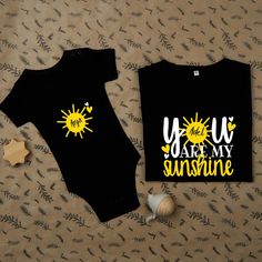 Celebrate the bond between mother and child with this charming Personalized Mommy & Me Sunshine T-Shirt Set. Perfect for baby showers, Mother's Day, or as a heartwarming birthday gift!Introducing the Personalized Mommy & Me Sunshine T-Shirt Set ñ a heartwarming and stylish gift that beautifully celebrates the special connection between a mother and her little one. This adorable matching set features a cozy t-shirt for mom and a complementary bodysuit for the baby, both adorned with the uplifting Cute Summer T-shirt For Parenting, Cute Cartoon Print T-shirt For Mother's Day, Cute Cartoon Print Tops For Mother's Day, Matching T-shirt For Birthday And Mother's Day, Matching Mother’s Day Birthday T-shirt, Family Matching Cartoon Print Tops For Mother's Day, Family Matching Cartoon Print T-shirt For Mother's Day, Personalized Matching T-shirts As Gifts, Cute T-shirt For Father's Day Gift