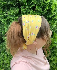 ook bright and sunny with this yellow floral knit medium width head covering that also converts to a headband! Its soft stretch knit fabric is comfortable for wearing any day of the week. Width measures about 9.25 inches from front edge going toward back of head. It can be worn as a headband or fully expanded as a medium head covering. Features matching fabric ties each measuring about 12 inches long. Front and back edges measure 18 inches from side to side. Hand wash and lay flat or hang to dry to preserve quality. Fabric has been pre-washed. Casual Spring Headband, Adjustable Yellow Headscarf In Headband Shape, Adjustable Yellow Headscarf Headband, Yellow Adjustable Headband Headscarf, Adjustable Yellow Bohemian Headwrap, Fitted Summer Beach Headwrap, Yellow Headwrap Headband One Size Fits Most, Yellow Headwrap One Size Fits Most, Yellow Headwrap Headband One Size