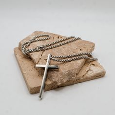 Strong and stylish, the Cross Stainless Steel Chain is a bold statement piece. With a 23.5-inch chain and a 2-inch cross pendant, this necklace adds edge to any look. Available in both classic stainless steel and sleek black. ✓ 316L Stainless Steel✓ Non-Tarnish✓ Affordable Luxury✓ Satisfaction Guarantee Included: 23.5-inch Stainless Steel Link Chain & 2-inch Cross Pendant