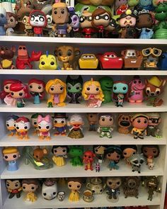 the shelves are filled with many different toy figurines