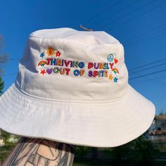 This colorful embroidered bucket hat adds a bit of fun to any outfit. The kidcore aesthetic and rainbow color palette adds to the playful nostalgia. Whether your favorite new  accessory, your go-to on bad hair days, or as a gift to a friend who loves dopamine dressing, this hat is sure to add a bit of joy to any outfit! ✰ ABOUT OUR PRODUCTS✰ Our products are comfy and made to order with unique and trendy designs. ✰ S H I P P I N G & P R O C E S S I N G ✰ This product is made especially for you as soon as you place an order, which is why it takes us a bit longer to ship it to you. Making products on demand instead of in bulk helps reduce overproduction, so thank you for making thoughtful purchasing decisions! Please allow 2-5 business days for your order to be processed before it ships. Onc Bucket Hat Aesthetic, Funny Bucket Hats, Kidcore Clothing, Hat Y2k, Trendy Hats, Cute Bucket Hat, Bob Chapeau, Indie Clothing, Embroidered Bucket Hat