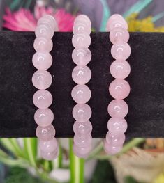 8mm stretch bead bracelet in Rose Quartz. Pink Rose Quartz Round Stretch Bracelet, Pink Rose Quartz Stretch Bracelet, Pink Spiritual Stretch Bracelet With Round Beads, Spiritual Pink Stretch Bracelet With Round Beads, Pink Rose Quartz Stretch Bracelet With 8mm Beads, Pink Stretch Bracelet With 8mm Beads, Casual Pink Stretch Bracelet With 8mm Beads, Casual Pink Crystal Bracelet With 8mm Beads, Bead Bracelets