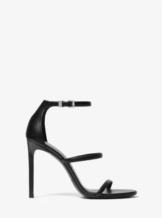 First seen on the Fall/Winter 2022 runway, our Nadege sandal is guaranteed to amp up any ensemble. Crafted from buttery-smooth Italian leather, the minimalist silhouette features three sleek straps and a polished buckle to create the illusion of longer legs. Modern Strap Heels For Party, Sleek Heels With Strap For Evening, Sleek Strap Heels For Evening, Modern Strappy Heels For Party, Leather Single Strap Sandals For Evening, Chic Evening Sandals With Single Strap, Leather Double Strap Heels For Evening, Leather Double Strap Heels For Party, Sleek Leather Heels With Strap