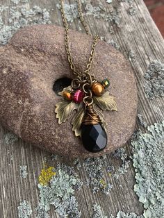 "Autumn season is coming to this parched land and I am so ready to break out my longer jeans, warmer layers and 🎃 pumpkin spice everything! My Falling Leaves jewelry set is the perfect addition for these cooler days! The earthy warm red and copper colors of the hand wire wrapped pearls and crystals against the bronze textured leaf pendant is stunning. I have two varieties of earrings to choose from.  Earring - https://www.etsy.com/listing/1580247891/ Earring - https://www.etsy.com/listing/15802 Autumn Necklace Fall Jewelry, Nature-inspired Brown Pendant Necklace, Nature-inspired Brown Pendant Jewelry, Nature-inspired Brown Gemstone Bead Necklace, Autum Leaf Necklace, Fall Jewelry Trends, Leaves Jewelry, 2024 Jewelry, Thanksgiving Jewelry