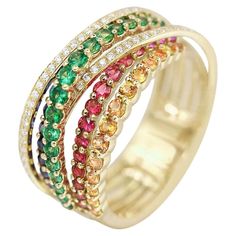 Ring Yellow Gold 14 K (Available in White Gold) Diamond 53-RND-0,13-G/VS2A Ruby 9-0,18ct Tsavorite 18-0,46ct Sapphire 14-0,37ct Multi Sapphire 20-0,47 ct Weight 5.54 grams Size 17 With a heritage of ancient fine Swiss jewelry traditions, NATKINA is a Geneva based jewellery brand, which creates modern jewellery masterpieces suitable for every day life. It is our honour to create fine jewelry, and it’s for that reason that we choose to only work with high-quality, enduring materials that can almos Yellow Gold Tsavorite Ring, Tsavorite Gemstone Ring Fine Jewelry, Green Sapphire Stackable Ring Fine Jewelry, Green Multi-stone Sapphire Diamond Ring, Anniversary Tsavorite Ring In Yellow Gold, Fine Jewelry Green Sapphire Multi-stone Ring, Fine Jewelry Green Multi-stone Sapphire Ring, Green Multi-stone Ruby Ring, Fine Jewelry, Multicolor Round Emerald Ring Fine Jewelry