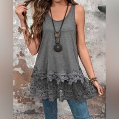 Szie Chart In Photos Grey Soft Casual Tank Scoop Neck Contrast Lace Hem Shaped Asymmetrical Length Long Fit Type Loose Medium Stretch 66% Polyester, 28% Viscose, 6% Elastane Shop Our Full Collection Of: Vacation Outfit - Preppy - Y2k - Cottagecore - Gypsy - Boho - Tiktok - Classic - Classy - Trendy - Work Office - Business Casual - Contemporary - Minimalist - Business Professional - Workplace Wear - Fall - Winter - Spring - Summer - 90s - Blouse - Holiday Party - Christmas - Thanksgiving - Date Lace Patchwork Tops For Layering, Casual Tops With Lace Patchwork For Layering, Spring Lace Patchwork Top For Layering, Spring Blouse With Lace Patchwork For Layering, Lace Patchwork Blouse For Spring Layering, Spring Lace Patchwork Blouse For Layering, Gray Sleeveless Bohemian Top, Gray Bohemian Sleeveless Top, Empire Waist Tops