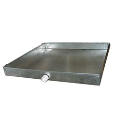 an empty metal tray on a white background