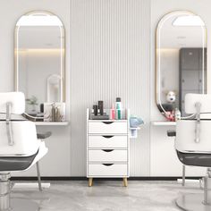 a salon room with two chairs and a dresser in front of the mirror on the wall