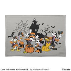 mickey mouse halloween scene with pumpkins, bats and other characters in front of a castle