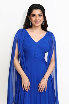 Blue padded bodice gown with a cinched broad waistband and long drape sleeves.
Components: 1
Pattern: Plain
Neckline: V Neck
Sleeve Type: Drape Sleeves
Fabric: Viscose Georgette, Lining: 100% Viscose Shantoon
Color: Blue
Other Details: 
Padded bodice
Occasion: Reception - Aza Fashions