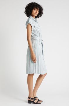 This striped cotton shirtdress evokes utility-inspired style with patch pockets at the chest and roll tabs at the shoulders. 45" length (size Medium) Front button closure Spread collar Short sleeves with roll-tab cuffs Chest flap-patch pockets; side-seam pockets Removable tie belt Unlined 100% cotton Machine wash, line dry Imported Nordstrom Cotton Spring Dress, Button-up Shirt Dress With Striped Collar For Work, Casual Striped Cotton Shirt Dress, Casual Striped Shirt Dress Relaxed Fit, Striped Collared Cotton Dress, Striped Fitted Cotton Shirt Dress, Fitted Striped Cotton Shirt Dress, Spring Shirt Dress With Striped Collar For Work, Spring Workwear Shirt Dress With Striped Collar