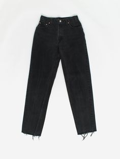 Vintage Levis 550 women's jeans 27 x 31 black dark wash 90s. These classic 550s feature a relaxed fit, tapered leg, zipper fly, distressed hems, rear patch and Levis red tab on the back pocket. Made for women, circa 1990. The original label states L, 8 REG. They measure 27 X 31. Condition: Very good; raw edge, frayed hems  Measurements, laid flat, in inches:  Waist: 13.5 Inside leg: 31 Front rise: 11.25 Hip (measured across the bottom of the fly): 19 Thigh (measured from crotch seam to outside o Levis 550, Jean Vintage, Womens Jeans, The Fly, Vintage Wear, Vintage Levis, Women's Jeans, Levis Jeans, Raw Edge