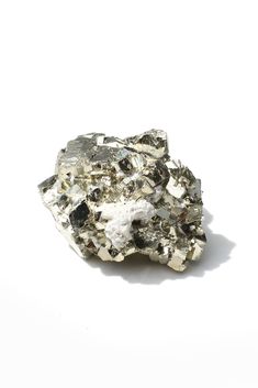 Pyrite is an iron sulfide mineral. Its crystal patterns are cubic, pyritohedral, or octahedral. The name pyrite is derived from the Greek word for fire. Pyrite’s shiny metallic appearance has earned it the nickname “fool’s gold.” The ancient Incas used Pyrite as mirrors. It is found all over the world, but important deposits are in Italy, Spain, and Peru. Pyrite is said to enhance willpower, helping one to overcome bad habits. Look closely, this beautiful one of a kind specimen from Peru has nat Crystal Photography, Fool’s Gold, Crystal Pattern, Pyrite Crystal, Greek Words, Instagram Ideas, Bad Habits, Beautiful One, Stones And Crystals