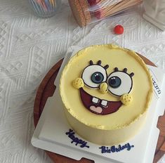 a birthday cake decorated to look like a cartoon character