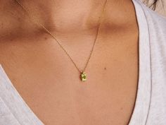 A dainty stone and delicate metallic chain are combined to create this Gold Pendant Necklace in bright peridot, your new favorite wear-anywhere accessory. Peridot is the birthstone of August. Peridot Necklace Silver, Peridot Necklace Gold, Gold Birthstone Necklace, August Birthstone Necklace, Peridot Birthstone, August Birthday, Peridot Jewelry, Peridot Necklace, Peridot Stone