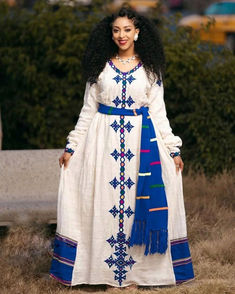 Indulge in the mesmerizing depths of sapphire with our vibrant blue Habesha Kemis, a celebration of fertility and cultural heritage that exudes timeless elegance. Crafted with meticulous attention to detail, this dress embodies the richness of Ethiopian tradition, adorned with intricate patterns that symbolize growth and abundance. The vibrant blue hue evokes a sense of serenity and vitality, making it the perfect attire for cultural ceremonies and joyous occasions. Habesha Kemis Ethiopian Dress, Habesha Dress Modern, Sindhi Dress, Habesha Dress, Ethiopian Traditional Dress, Ethiopian Dress, Habesha Kemis, Dress Modern, Cultural Celebration