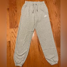 Grey Nike Sweatpants Hardly Worn And Like Brand New Gray Sweatpants Nike, Gray Sweatpants Women, Nike Casual Full-length Joggers, Nike Casual Full-length Pants, Nike Casual Full Length Pants, Nike Casual Relaxed Fit Pants, Casual Nike Sweatpants With Elastic Waistband, Nike Jogger Trousers For Loungewear, Nike Bottoms With Pockets For Loungewear