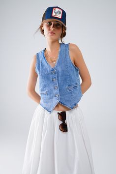 The Fitted Denim Vest is a staple piece for any wardrobe, providing versatility and style. Made from high-quality denim, it offers durability and comfort. With its timeless design, it can be dressed up or down for any occasion. Add it to your collection today. 4 button front closure Decorative pockets V-neck Faux welt pockets Material Cotton elastane blend Machine washable Trendy Cotton Denim Vest With Snap Buttons, Dark Wash Denim Vest With Pockets For Day Out, Cotton Button-up Denim Vest With Pockets, Button-up Cotton Denim Vest With Pockets, Casual Button-up Denim Vest With Pockets, Cotton Denim Vest With Pockets, Casual Cotton Denim Vest With Buttons, Spring Cotton Denim Vest With Snap Buttons, Fitted Denim Top For Everyday