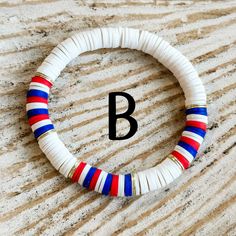 Patriotic White Stretch Bracelet, Patriotic White Stretch Bracelet With Round Beads, White Patriotic Bracelet As Gift, Patriotic White Friendship Bracelets Gift, Patriotic White Friendship Bracelets As Gift, Patriotic White Stretch Bracelet As Gift, Patriotic White Stretch Bracelet Gift, White And Blue Bracelet, Stack Bracelet