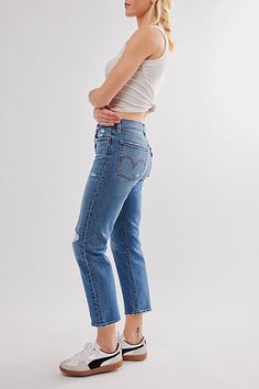 **See above for the Levi’s size chart to find your best fit.** **Fit:** May run small, we recommend sizing up. In Levi’s authentic rigid denim, these high-rise jeans are fitted through the hips and thighs. * Cropped length with a frayed hem * Button fly * Five-pocket style | Levi's Wedgie Straight Jeans at Free People in Medium Wash, Size: 26 Fitted Cutoff Casual Jeans, Casual Fitted Cutoff Jeans, Medium Wash Fitted Cutoff Jeans, Fitted Medium Wash Cutoff Jeans, Fitted Mid-rise Cropped Jeans In Medium Wash, Mid-rise Fitted Cropped Jeans, Mid-rise Fitted Cropped Jeans For Everyday, Fitted Cutoff Light Wash Jeans, Fitted Dark Wash Cutoff Jeans