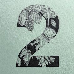 the letter s is made up of flowers and leaves