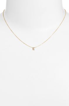 Personalize your stack with this layering-friendly necklace centered with a dainty pendant of your favorite initial filled with 14-karat yellow gold. 16" length 14k-gold fill Made in the USA Gold E Necklace, E Initial Necklace, Letter K Necklace, Necklace With Letter, Burr Basket, K Necklace, Fun List, Gold Initial Pendant, Summer Fun List