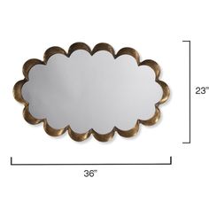 an image of a mirror with scalloped edges